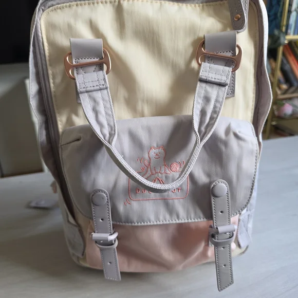 Doughnut Macaroon 16L Pastel Multi-Color Backpack With 14 Inch Laptop Sleeve - Picture 2 of 6